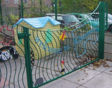 Gates with words, patterns and creatures, for a Stockport nursery school