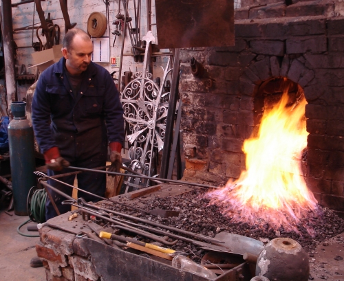 Martin forging the bars to form reeds