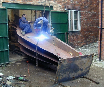 Working on one section of the sculpture, at Luke Lister workshop